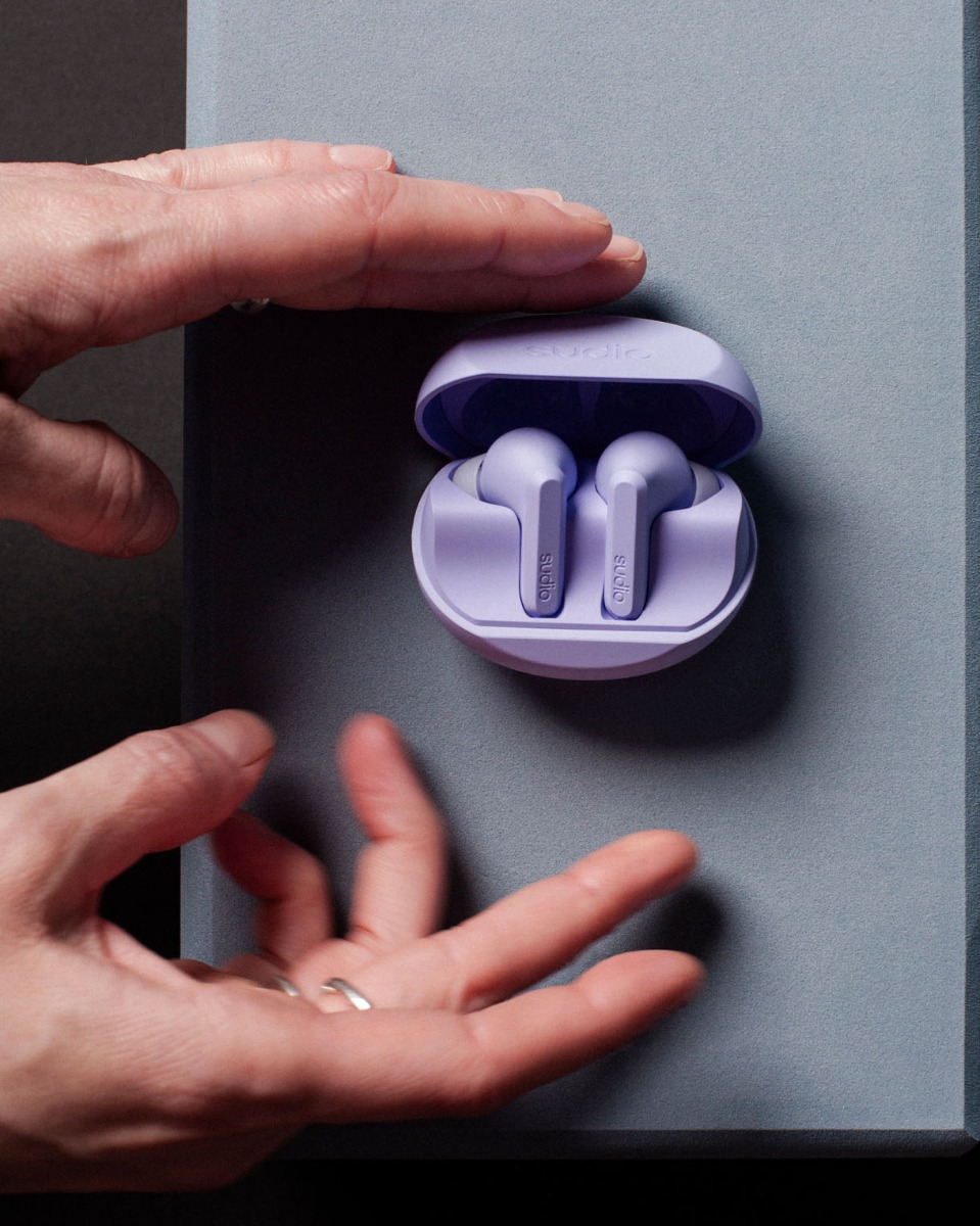 Sudio A3 Pro earbuds on a table
