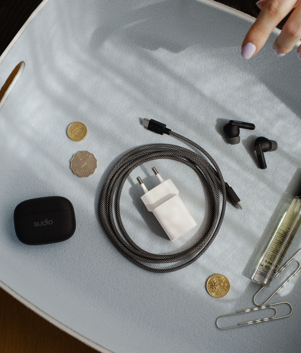 Sudio Charging Plug in Use