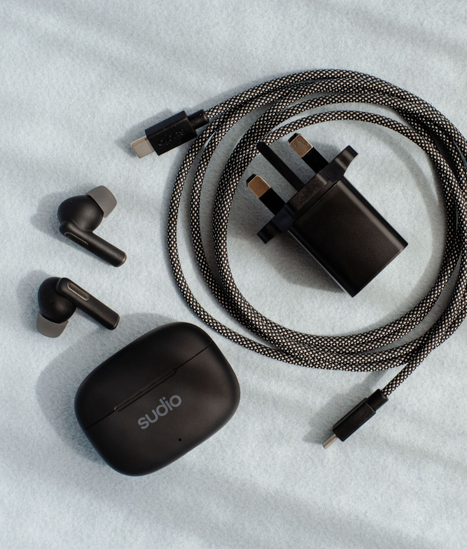 Sudio Charging Plug in Use