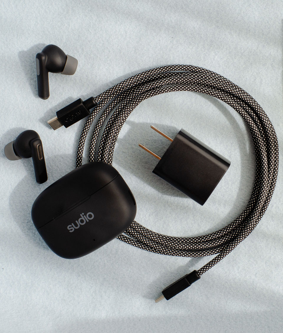 Sudio Charging Plug in Use