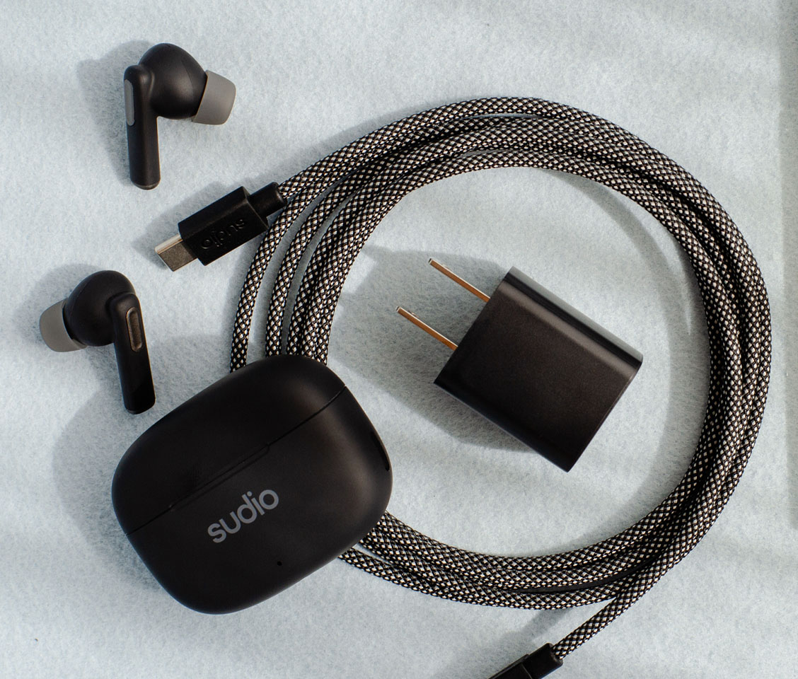 Sudio Charging Plug in Use