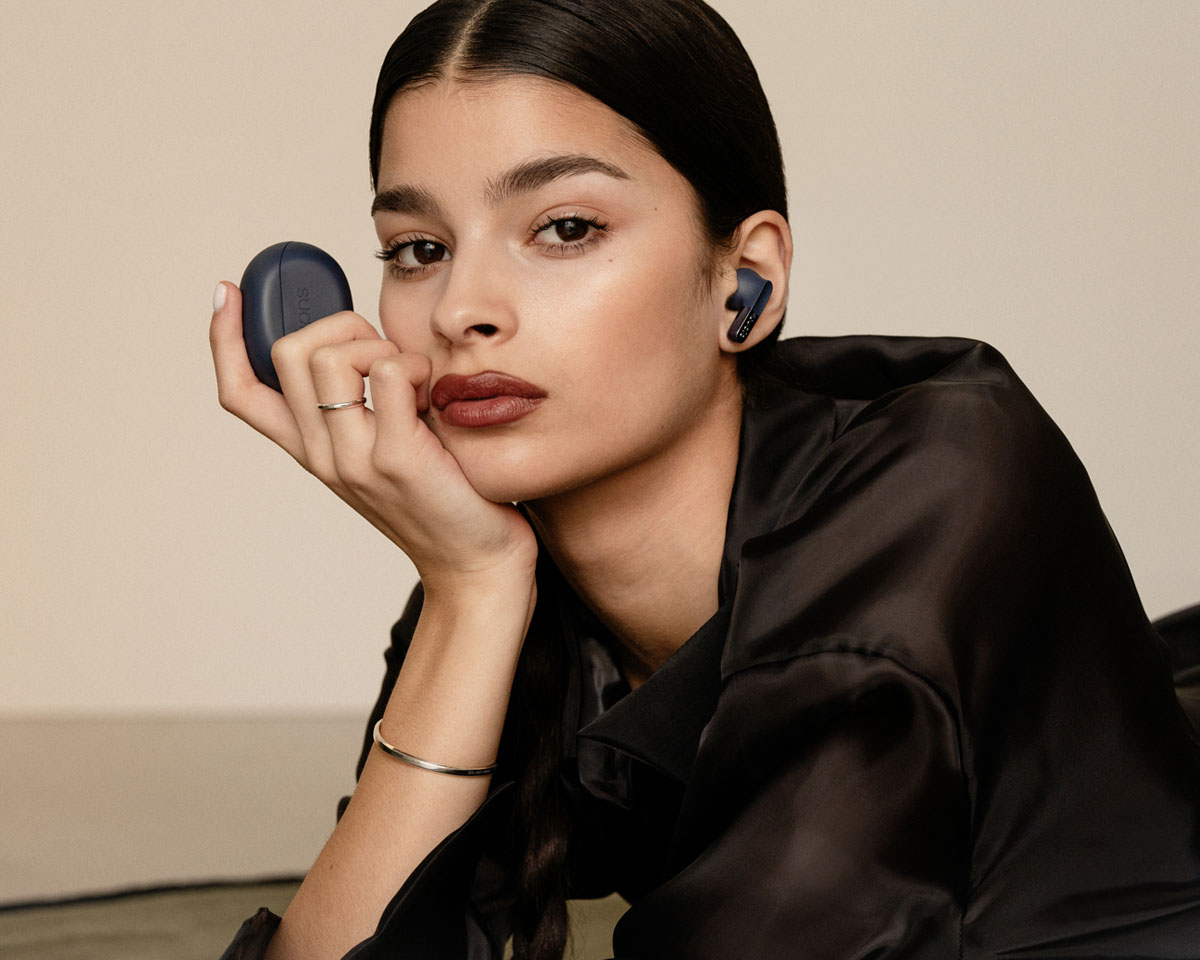Sudio earphones on a female model